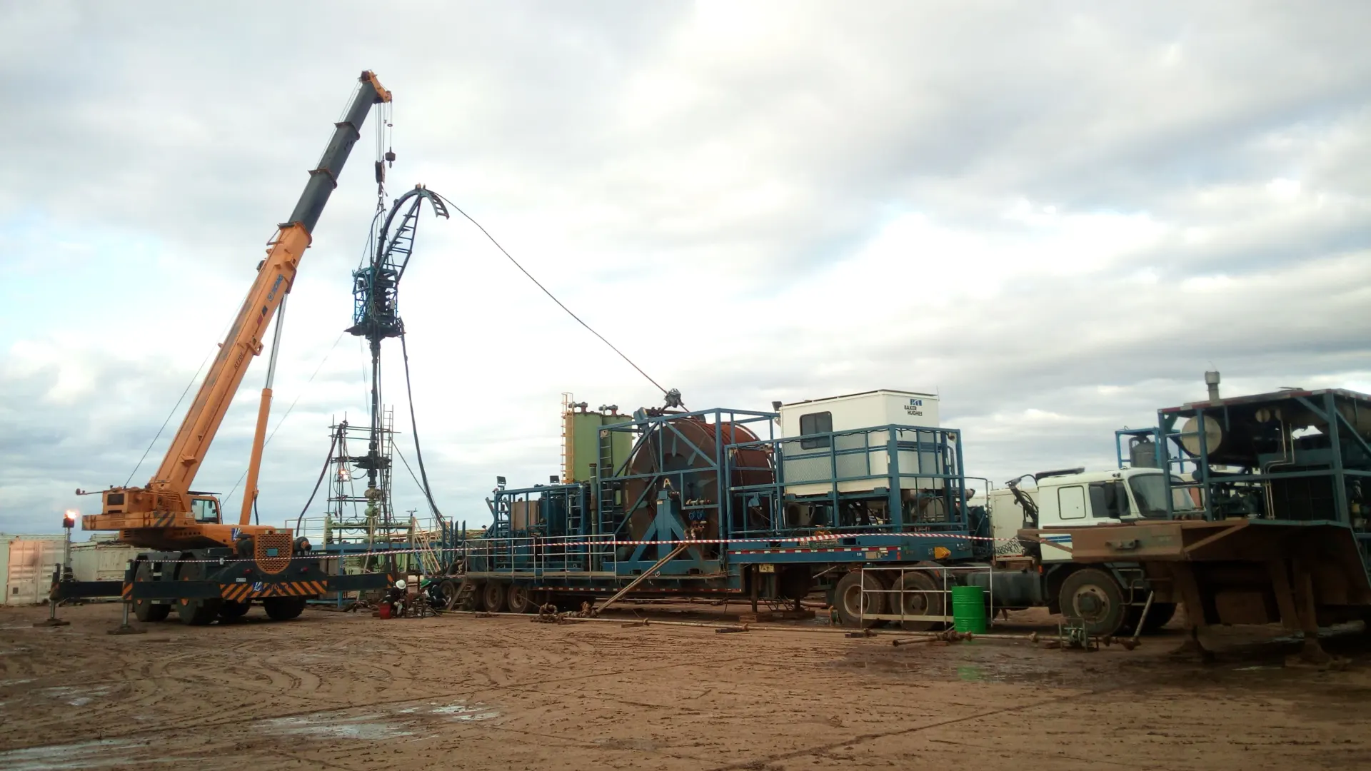 Crane lifting equipment on a rig site